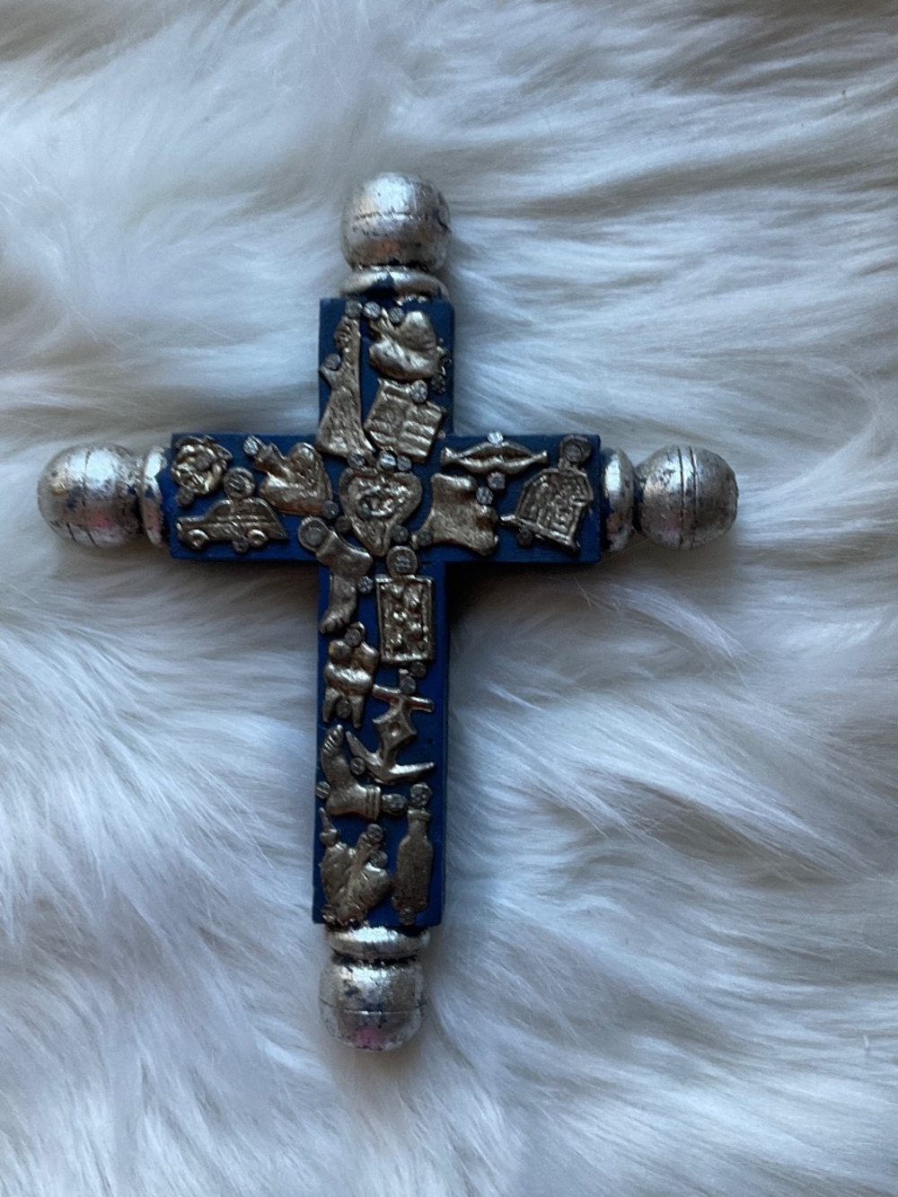 Wood cross with milagros